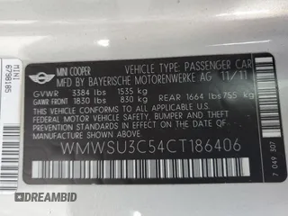 2012 MINI Hardtop with VIN WMWSU3C54CT186406, listed as a Copart auction lot 60940305 with 106,819 mi miles and Salvage title. Bid and sale history available at DreamBid. Image 14.