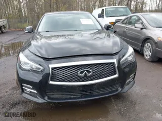 2017 Infiniti Q50 3.0t Premium with VIN JN1EV7AR5HM838044, listed as a IAAI auction lot 42030697 with 104,778 mi miles. Bid and sale history available at carsss.com. Image 12.