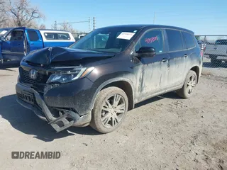 2019 Honda Passport Sport z VIN 5FNYF8H23KB025310, wystawiony jako IAAI lot #41958571 z przebiegiem 63 313 mil mil oraz . Historia ofert i sprzedaży dostępna na DreamBid. Obrazek 2.