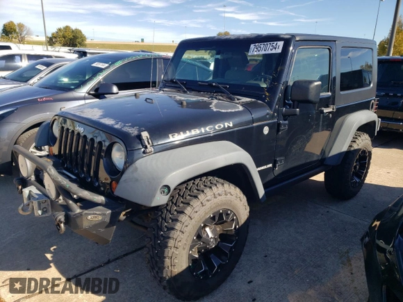 2010 Jeep Wrangler Rubicon with VIN 1J4BA6D10AL203265, listed as a Copart auction lot 79570754 with 114,840 mi miles and Salvage title. Bid and sale history available at DreamBid. Image 1.