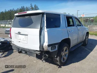 2016 Chevrolet Tahoe LT with VIN 1GNSKBKC9GR272257, listed as a IAAI auction lot 42193967 with 101,967 mi miles and . Bid and sale history available at DreamBid. Image 4.
