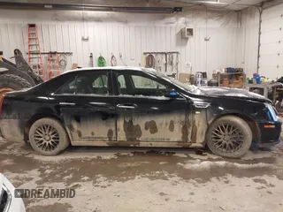 2010 Cadillac STS AWD with VIN 1G6DU6EV2A0125065, listed as a IAAI auction lot 41229886 with 84,954 mi miles and . Bid and sale history available at DreamBid. Image 14.