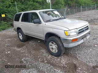 1997 Toyota 4Runner SR5 z VIN JT3HN86R1V0117123, wystawiony jako IAAI lot #42557501 z przebiegiem 259 284 mil mil oraz . Historia ofert i sprzedaży dostępna na DreamBid. Obrazek 1.