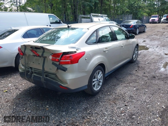 2017 Ford Focus SE with VIN 1FADP3F2XHL304752, listed as a IAAI auction lot 42492195 with 72,142 mi miles and . Bid and sale history available at DreamBid. Image 4.