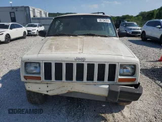 1999 Jeep Cherokee Sport z VIN 1J4FF68S3XL597049, wystawiony jako Copart lot #58736325 z przebiegiem 134 684 mil mil oraz Nie do naprawy • Non repairable. Historia ofert i sprzedaży dostępna na DreamBid. Obrazek 5.