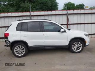 2015 Volkswagen Tiguan R-Line with VIN WVGAV7AX5FW585248, listed as a IAAI auction lot 41909618 with 137,448 mi miles and . Bid and sale history available at DreamBid. Image 14.