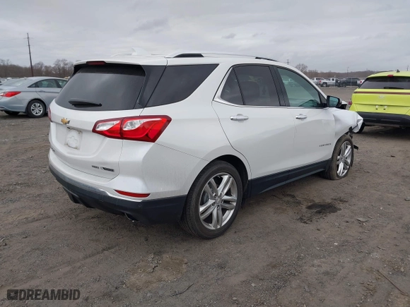2018 Chevrolet Equinox Premier with VIN 2GNAXWEX6J6140692, listed as a IAAI auction lot 41729043 with 100,806 mi miles. Bid and sale history available at carsss.com. Image 4.