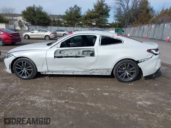 2022 BMW 4 Series 430i xDrive with VIN WBA73AP09NCJ28175, listed as a IAAI auction lot 41486064 with 27,312 mi miles and . Bid and sale history available at DreamBid. Image 14.