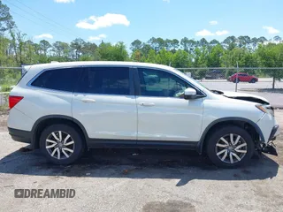 2019 Honda Pilot EX-L with VIN 5FNYF5H42KB026108, listed as a IAAI auction lot 42387593 with 112,556 mi miles and . Bid and sale history available at DreamBid. Image 13.