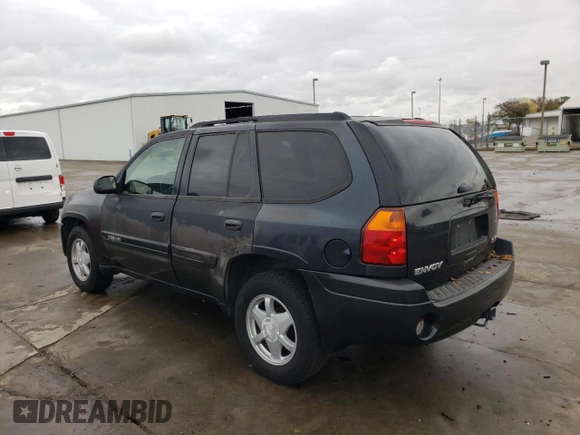 2003 GMC Envoy SLE with VIN 1GKDS13S632226264, listed as a Copart auction lot 82461694 with Not Provided miles and Clean Title. Bid and sale history available at carsss.com. Image 2.