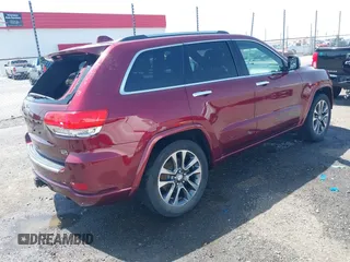 2017 Jeep Grand Cherokee Overland with VIN 1C4RJFCG7HC658943, listed as a IAAI auction lot 42282213 with 103,291 mi miles and . Bid and sale history available at DreamBid. Image 4.