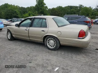 1999 Ford Crown Victoria LX с VIN 2FAFP74W7XX231833, выставлен на аукционе Copart как лот 58340925 с пробегом 156 032 миль миль и Списание • Salvage title. История ставок и продаж доступна на DreamBid. Изображение 2.