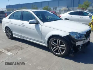 2014 Mercedes-Benz C-Class C 250 Sport with VIN WDDGF4HB8EA930990, listed as a IAAI auction lot 41931264 with 129,234 mi miles. Bid and sale history available at carsss.com. Image 1.