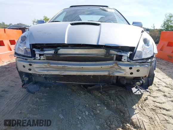 2002 Toyota Celica GT with VIN JTDDR32TX20129902, listed as a IAAI auction lot 41443750 with 203,652 mi miles. Bid and sale history available at carsss.com. Image 6.