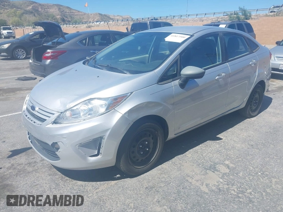 2013 Ford Fiesta S with VIN 3FADP4AJ0DM195196, listed as a IAAI auction lot 41817500 with 124,662 mi miles and . Bid and sale history available at DreamBid. Image 2.