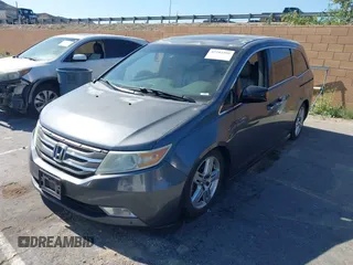 2011 Honda Odyssey Touring with VIN 5FNRL5H96BB009580, listed as a IAAI auction lot 42202595 with Not provided miles and . Bid and sale history available at DreamBid. Image 17.