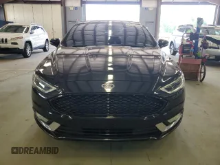 2017 Ford Fusion Titanium z VIN 3FA6P0K96HR124759, wystawiony jako Copart lot #61414395 z przebiegiem 175 655 mil mil oraz Czysty tytuł • Clean title. Historia ofert i sprzedaży dostępna na DreamBid. Obrazek 5.