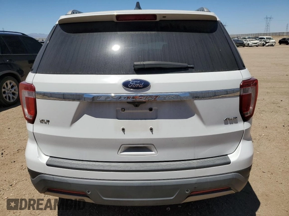 2019 Ford Explorer XLT z VIN 1FM5K8D88KGA42873, wystawiony jako Copart lot #64584935 z przebiegiem 143 439 mil mil oraz Szkoda całkowita • Salvage title. Historia ofert i sprzedaży dostępna na DreamBid. Obrazek 6.