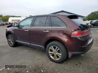2010 Lincoln MKX with VIN 2LMDJ8JC9ABJ30736, listed as a Copart auction lot 71791594 with 116,083 mi miles and Salvage Title. Bid and sale history available at carsss.com. Image 2.