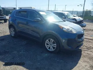 2018 Kia Sportage LX with VIN KNDPM3AC1J7424163, listed as a IAAI auction lot 41989534 with 87,220 mi miles and . Bid and sale history available at carsss.com. Image 1.