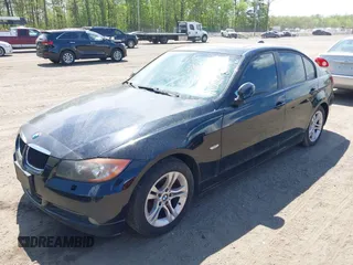 2008 BMW 3 Series 328xi with VIN WBAVC73518KP39386, listed as a IAAI auction lot 39828477 with 188,917 mi miles. Bid and sale history available at carsss.com. Image 2.
