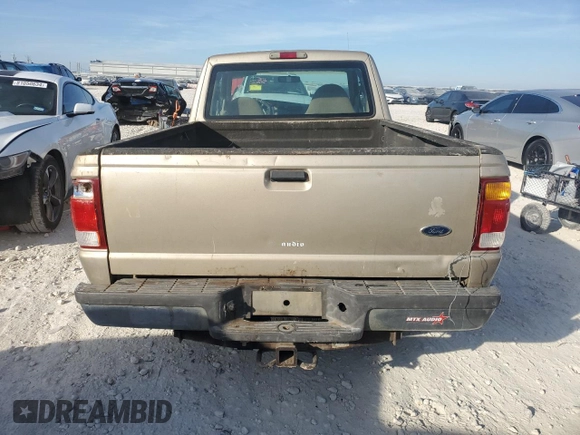 1999 Ford Ranger XLT with VIN 1FTYR14X1XPB75400, listed as a Copart auction lot 80879084 with 255,136 mi miles and Salvage Title. Bid and sale history available at DreamBid. Image 6.