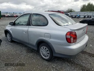 2000 Toyota ECHO with VIN JTDAT1239Y0040310, listed as a Copart auction lot 69115394 with 103,347 mi miles and Salvage Title. Bid and sale history available at DreamBid. Image 2.