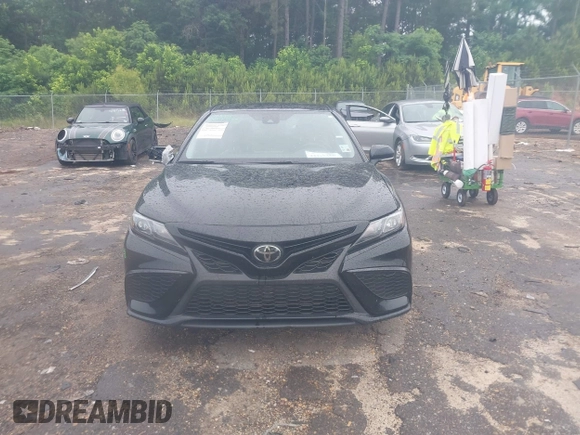 2023 Toyota Camry SE with VIN 4T1G11AKXPU827360, listed as a IAAI auction lot 42217356 with 57,497 mi miles and . Bid and sale history available at DreamBid. Image 12.