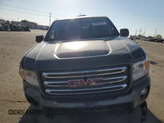 2017 GMC Canyon z VIN 1GTP6CE1XH1252005, wystawiony jako Copart lot #74982794 z przebiegiem 62 797 mil mil oraz Szkoda całkowita • Salvage title. Historia ofert i sprzedaży dostępna na DreamBid. Obrazek 5.