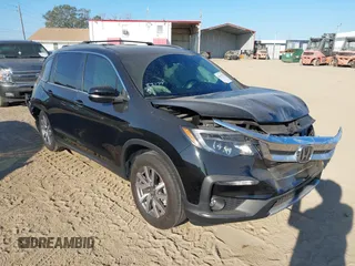 2021 Honda Pilot EX-L with VIN 5FNYF5H50MB038821, listed as a IAAI auction lot 41519771 with 29,401 mi miles. Bid and sale history available at carsss.com. Image 1.