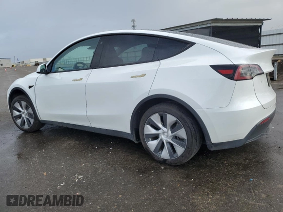 2023 Tesla Model Y Long Range z VIN 7SAYGAEE5PF743079, wystawiony jako Copart lot #45570655 z przebiegiem 46 145 mil mil oraz Szkoda całkowita • Salvage title. Historia ofert i sprzedaży dostępna na DreamBid. Obrazek 2.