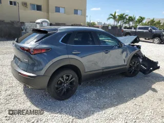 2024 Mazda CX-30 2.5 S Carbon Edition with VIN 3MVDMBCMXRM673483, listed as a Copart auction lot 46810935 with 3,047 mi miles and Salvage Title. Bid and sale history available at carsss.com. Image 3.