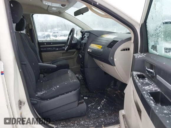 2009 Dodge Grand Caravan with VIN 2D8HN11E19R703857, listed as a IAAI auction lot 41195565 with 199,776 mi miles and . Bid and sale history available at DreamBid. Image 5.