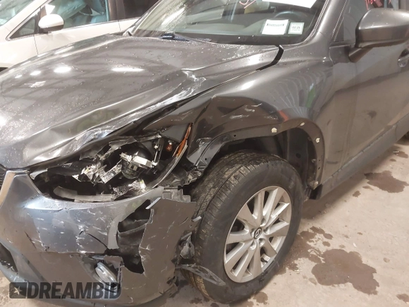 2015 Mazda CX-5 Touring with VIN JM3KE4CY3F0460501, listed as a IAAI auction lot 41889743 with 160,367 mi miles. Bid and sale history available at carsss.com. Image 6.