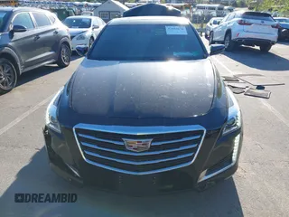 2015 Cadillac CTS Premium AWD with VIN 1G6AZ5S35F0129572, listed as a IAAI auction lot 42045670 with 62,758 mi miles and . Bid and sale history available at DreamBid. Image 12.