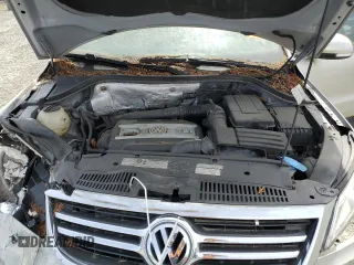 2011 Volkswagen Tiguan SEL z VIN WVGBV7AX6BW559854, wystawiony jako Copart lot #56268195 z przebiegiem 107 428 mil mil oraz Czysty tytuł • Clean title. Historia ofert i sprzedaży dostępna na DreamBid. Obrazek 12.