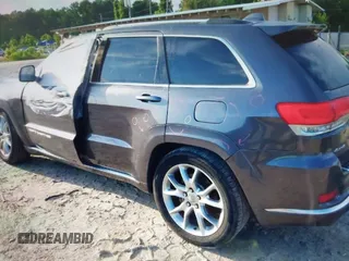 2015 Jeep Grand Cherokee Summit with VIN 1C4RJFJG0FC611768, listed as a IAAI auction lot 42468497 with 217,032 mi miles and . Bid and sale history available at DreamBid. Image 13.