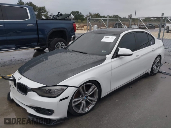 2013 BMW 3 Series 328i with VIN WBA3A5C5XDF356793, listed as a IAAI auction lot 40881444 with 156,178 mi miles. Bid and sale history available at carsss.com. Image 2.