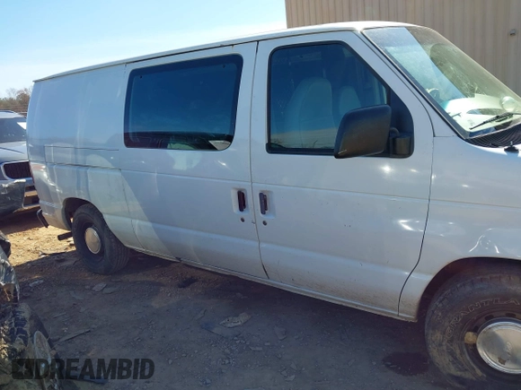 1999 Ford Econoline Cargo with VIN 1FTRE14W0XHB64440, listed as a IAAI auction lot 41645551 with 239,114 mi miles. Bid and sale history available at carsss.com. Image 13.