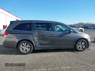 2016 Honda Odyssey SE with VIN 5FNRL5H32GB089740, listed as a IAAI auction lot 41402635 with 120,666 mi miles and . Bid and sale history available at DreamBid. Image 13.