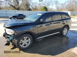 2012 Dodge Durango SXT with VIN 1C4RDHAG5CC126668, listed as a Copart auction lot 87046034 with 313,129 mi miles and Salvage Title. Bid and sale history available at carsss.com. Image 1.