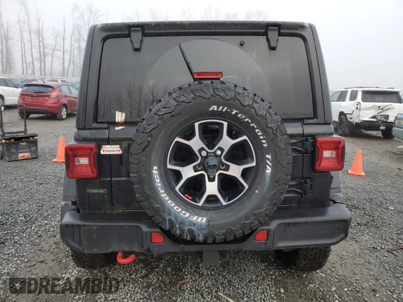 2021 Jeep Wrangler Unlimited Rubicon with VIN 1C4JJXFM7MW818199, listed as a Copart auction lot 87428474 with 18,696 mi miles and Salvage Title. Bid and sale history available at carsss.com. Image 6.