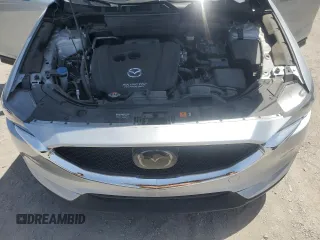 2018 Mazda CX-5 Grand Touring with VIN JM3KFBDM0J0377243, listed as a Copart auction lot 62199295 with 37,930 mi miles and Salvage title. Bid and sale history available at DreamBid. Image 12.