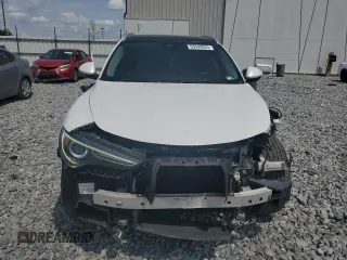 2018 Alfa Romeo Stelvio Ti z VIN ZASFAKBN8J7B79495, wystawiony jako Copart lot #55599025 z przebiegiem 143 606 mil mil oraz Szkoda całkowita • Salvage title. Historia ofert i sprzedaży dostępna na DreamBid. Obrazek 5.