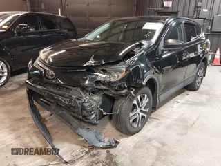2018 Toyota RAV4 LE with VIN 2T3BFREV7JW768376, listed as a IAAI auction lot 41864571 with 292,147 mi miles. Bid and sale history available at carsss.com. Image 19.