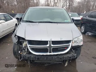 2014 Dodge Grand Caravan American Value with VIN 2C4RDGBG9ER187198, listed as a IAAI auction lot 41669334 with 204,803 mi miles and . Bid and sale history available at DreamBid. Image 13.