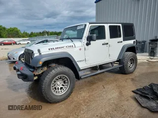 2015 Jeep Wrangler Unlimited Rubicon with VIN 1C4BJWFGXFL518301, listed as a Copart auction lot 61910775 with 153,945 mi miles and Clean title. Bid and sale history available at DreamBid. Image 1.