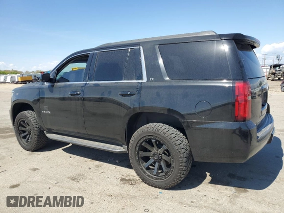 2015 Chevrolet Tahoe LT with VIN 1GNSCBKC2FR115942, listed as a Copart auction lot 54125655 with 132,502 mi miles and Salvage title. Bid and sale history available at DreamBid. Image 2.