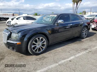 2006 Chrysler 300 C z VIN 2C3KA63H26H408714, wystawiony jako Copart lot #54602605 z przebiegiem 156 606 mil mil oraz Szkoda całkowita • Salvage title. Historia ofert i sprzedaży dostępna na DreamBid. Obrazek 1.