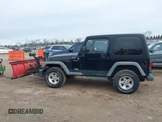 2006 Jeep Wrangler Sport with VIN 1J4FA49S66P746787, listed as a IAAI auction lot 41537730 with 97,365 mi miles. Bid and sale history available at carsss.com. Image 14.